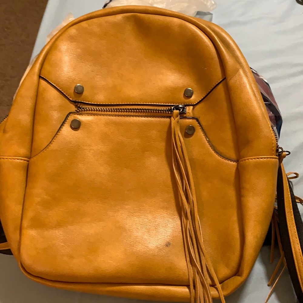Mustard colored backpack